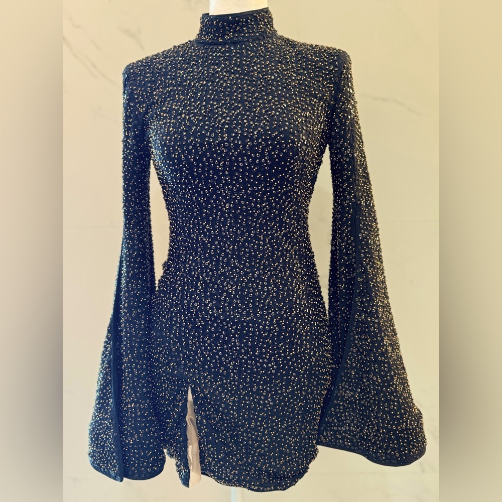 Mr. Gibson Mini Dress in Black XS
Michael Costello